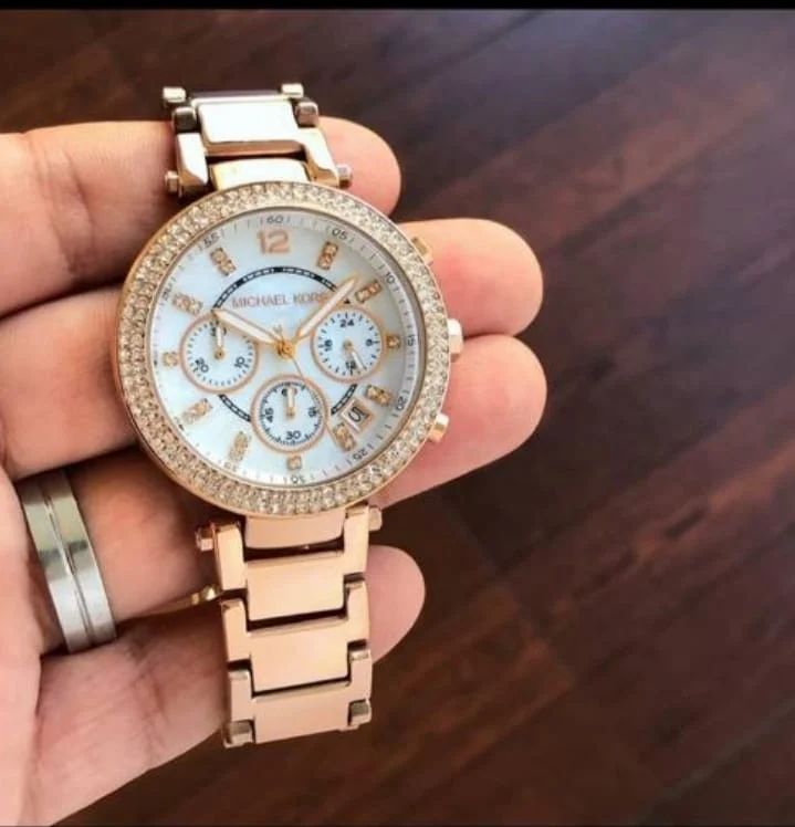 Round Michael Kors ladies watch golden